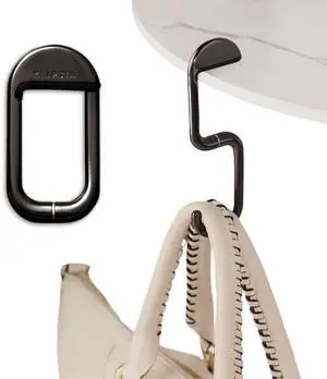 FLIP Bag Hook - Newly Redesigned. Portable Purse Hanger for Table with Magnetic Closure - Now Holds up to 50 lbs (Chrome Black) FLIP Bag Hook - Newly Redesigned. Portable Purse Hanger for Table with Magnetic Closure - Now Holds up to 50 lbs (Chrome Black)