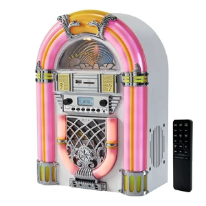 Athena Mini Jukebox/Tabletop CD Player/Bluetooth Speaker/Radio/USB and SD Card Player with Retro LED Lighting System (Pink White) Athena Mini Jukebox/Tabletop CD Player/Bluetooth Speaker/Radio/USB and SD Card Player with Retro LED Lighting System (Pink White)