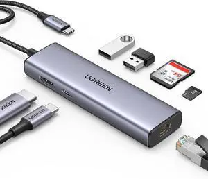 UGREEN USB-C Hub 7 in 1 4K@60Hz HDMI, 2 USB-A, 1x RJ45 1 Gigabit, 1x SD&TF Card Reader, 100W PD for MacBook Pro, MacBook Air, iPad Pro, Chromebook, and More. UGREEN USB-C Hub 7 in 1 4K@60Hz HDMI, 2 USB-A, 1x RJ45 1 Gigabit, 1x SD&TF Card Reader, 100W PD for MacBook Pro, MacBook Air, iPad Pro, Chromebook, and More.