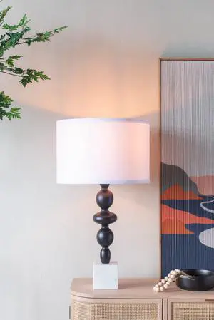 D15x29.5" Black and White Table Lamp with Round Four Tiered Body (Lamp Shade Assembly Required) D15x29.5" Black and White Table Lamp with Round Four Tiered Body (Lamp Shade Assembly Required)