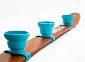 Collapsible and Portable Shot Ski Kit - 4-pack w/ carrying pack. Silicone cups with an adjustable strap that turn any object into a "shot ski" Collapsible and Portable Shot Ski Kit - 4-pack w/ carrying pack. Silicone cups with an adjustable strap that turn any object into a "shot ski"
