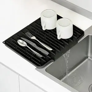 Silicone Dish Drying Mat, Black, 15.7''x12.4'' | Counter Drying Pad with Raised Ridges, 5-Degree Slope, and Front Lip to Help Channel Water into the Sink Silicone Dish Drying Mat, Black, 15.7''x12.4'' | Counter Drying Pad with Raised Ridges, 5-Degree Slope, and Front Lip to Help Channel Water into the Sink