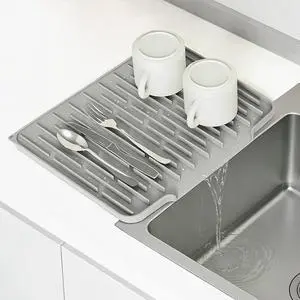 Silicone Dish Drying Mat, Light Gray, 15.7''x12.4'' | Counter Drying Pad with Raised Ridges, 5-Degree Slope, and Front Lip to Help Channel Water into the Sink Silicone Dish Drying Mat, Light Gray, 15.7''x12.4'' | Counter Drying Pad with Raised Ridges, 5-Degree Slope, and Front Lip to Help Channel Water into the Sink