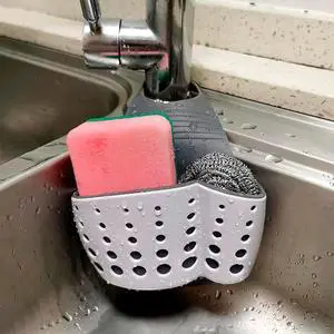 Hanging Sponge Holder for Kitchen Sink, Over Faucet Silicone Caddy | Adjustable Strap Wraps Most Taps While Drain Holes Let Sponges Dry Fast - White Silicone Wipes Clean, No Suction Cups Needed Hanging Sponge Holder for Kitchen Sink, Over Faucet Silicone Caddy | Adjustable Strap Wraps Most Taps While Drain Holes Let Sponges Dry Fast - White Silicone Wipes Clean, No Suction Cups Needed