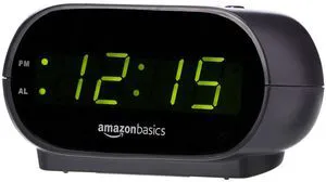 Amazon Basics Small Digital Oval Alarm Clock with LED Display, Nightlight, Snooze Function & Battery Backup, Black, 4.5x3.5x2.4Inches Amazon Basics Small Digital Oval Alarm Clock with LED Display, Nightlight, Snooze Function & Battery Backup, Black, 4.5x3.5x2.4Inches