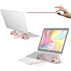 Magnetic Adjustable Travel Laptop Stand for Digital Nomads and Business Travelers. Compact, Foldable, and Ideal for Desk Use. Elevate Your Work Experience with Our Laptop Riser on the Go Magnetic Adjustable Travel Laptop Stand for Digital Nomads and Business Travelers. Compact, Foldable, and Ideal for Desk Use. Elevate Your Work Experience with Our Laptop Riser on the Go