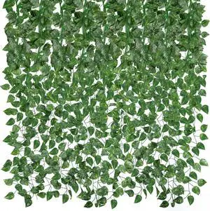 CEWOR 14 Pack 98ft Artificial Ivy Greenery Garland, Fake Vines Hanging Plants Backdrop for Room Bedroom Wall Decor, Green Leaves for Jungle Theme Christmas Party Wedding Decoration CEWOR 14 Pack 98ft Artificial Ivy Greenery Garland, Fake Vines Hanging Plants Backdrop for Room Bedroom Wall Decor, Green Leaves for Jungle Theme Christmas Party Wedding Decoration