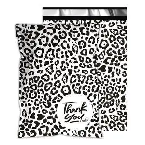 Poly Mailers 10x13 Inch, 25 Pack, Leopard Self-Seal Shipping Bags | 2.4 mil polyethylene, self-seal closure, opaque inner layer, for clothing, boutiques, gifts, and small business shipping Poly Mailers 10x13 Inch, 25 Pack, Leopard Self-Seal Shipping Bags | 2.4 mil polyethylene, self-seal closure, opaque inner layer, for clothing, boutiques, gifts, and small business shipping