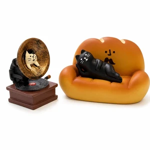 3-Piece Cat Figurines Set, Resin Black Cat Desk Decor | Miniature resin scene with lounging black cat, bread sofa and vintage gramophone for desks, bookshelves and home offices 3-Piece Cat Figurines Set, Resin Black Cat Desk Decor | Miniature resin scene with lounging black cat, bread sofa and vintage gramophone for desks, bookshelves and home offices
