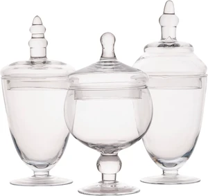 Clear Glass Apothecary Jar Set of 3 with Lids - Decorative Glass Jars for Bathroom, Kitchen, Pantry Storage - Handcrafted, Graduated Heights 10, 9.5, 8.5 In Clear Glass Apothecary Jar Set of 3 with Lids - Decorative Glass Jars for Bathroom, Kitchen, Pantry Storage - Handcrafted, Graduated Heights 10, 9.5, 8.5 In