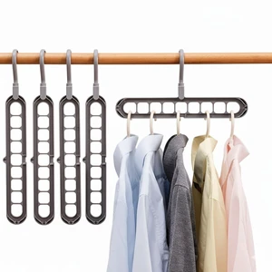 Space Saving Clothes Hangers | 4 Pack Sturdy Cascading Hangers with 9 Holes for Heavy Clothes | Closet Organizers and Storage | Durable Premium Quality Plastic | 4 Pack - Grey Space Saving Clothes Hangers | 4 Pack Sturdy Cascading Hangers with 9 Holes for Heavy Clothes | Closet Organizers and Storage | Durable Premium Quality Plastic | 4 Pack - Grey