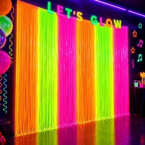 Glow in the Dark Party Supplies, 2 Pack Foil Fringe Curtains, 6.6 x 6.6 Ft Neon party decorations and glow party backdrop for blacklight birthday parties, photo booths, graduations and dance parties Glow in the Dark Party Supplies, 2 Pack Foil Fringe Curtains, 6.6 x 6.6 Ft Neon party decorations and glow party backdrop for blacklight birthday parties, photo booths, graduations and dance parties
