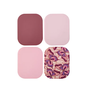 Dolly Parton Plastic 4-Piece Cutting Mat Set in Assorted Colors for Food Prep Dolly Parton Plastic 4-Piece Cutting Mat Set in Assorted Colors for Food Prep