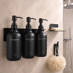 Upgraded Wall Mount Shampoo and Conditioner Shower Dispenser Set, Black. This drill-free bathroom organizer comes with 3 refillable pump bottles, plus bonus soap dish and hook. Mount easily with stron Upgraded Wall Mount Shampoo and Conditioner Shower Dispenser Set, Black. This drill-free bathroom organizer comes with 3 refillable pump bottles, plus bonus soap dish and hook. Mount easily with stron