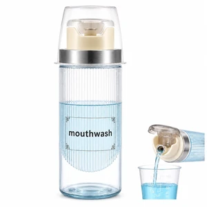 13.5oz Clear Glass Mouthwash Dispenser with Measuring Cup | with Measuring Cup.Tilt to pour, no pump. Dishwasher-safe. Use for mouthwash, oil, or vinegar. Leak-proof stopper. 13.5oz Clear Glass Mouthwash Dispenser with Measuring Cup | with Measuring Cup.Tilt to pour, no pump. Dishwasher-safe. Use for mouthwash, oil, or vinegar. Leak-proof stopper.