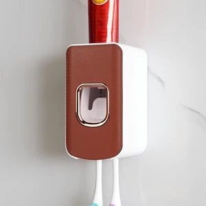 2 Slot Plastic Toothbrush Holder and Toothpaste Dispenser Wall Mounted, Automatic Toothpaste Squeezer, 2 in 1 Tooth Brush Toothpaste Organizer for Shower (Brown) 2 Slot Plastic Toothbrush Holder and Toothpaste Dispenser Wall Mounted, Automatic Toothpaste Squeezer, 2 in 1 Tooth Brush Toothpaste Organizer for Shower (Brown)