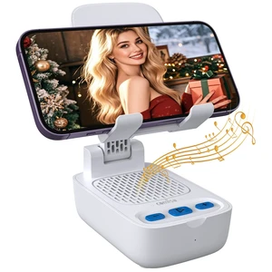Phone Stand with Bluetooth Speaker, HD Stereo, Adjustable, Black 2-in-1 phone stand with wireless speaker; adjustable angle for viewing; compatible with iPhones, iPads, Samsung devices Phone Stand with Bluetooth Speaker, HD Stereo, Adjustable, Black 2-in-1 phone stand with wireless speaker; adjustable angle for viewing; compatible with iPhones, iPads, Samsung devices