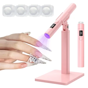 Mini UV Light for Nails, Portable Handheld UV Light for Gel Nails with Stand, Rechargeable Cordless Flash Cure Nail Lamp, Squish Pen Gel Lamp for Home/Manicure/Salon Fast Curing Pink Mini UV Light for Nails, Portable Handheld UV Light for Gel Nails with Stand, Rechargeable Cordless Flash Cure Nail Lamp, Squish Pen Gel Lamp for Home/Manicure/Salon Fast Curing Pink