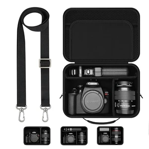 Hard Shell Camera Case Compatible with Canon EOS Rebel T7/R50/R100 and More DSLR & Mirrorless Cameras Portable Travel Bag with Adjustable Dividers, Mesh Pocket & Shoulder Strap (Black) Hard Shell Camera Case Compatible with Canon EOS Rebel T7/R50/R100 and More DSLR & Mirrorless Cameras Portable Travel Bag with Adjustable Dividers, Mesh Pocket & Shoulder Strap (Black)