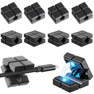9 Pack Magnetic Cable Clips, Cord Holder Organizer for Desk, Wall | Nightstand snap-lock clips. Phone Charger Cord Holder. Residue-free adhesive. Versatile cord organizer for car, home, office. 9 Pack Magnetic Cable Clips, Cord Holder Organizer for Desk, Wall | Nightstand snap-lock clips. Phone Charger Cord Holder. Residue-free adhesive. Versatile cord organizer for car, home, office.