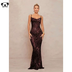 Leopard Back Tie Long Dress - A long dress with a leopard print and a back tie detail. Redwood S Leopard Back Tie Long Dress - A long dress with a leopard print and a back tie detail. Redwood S