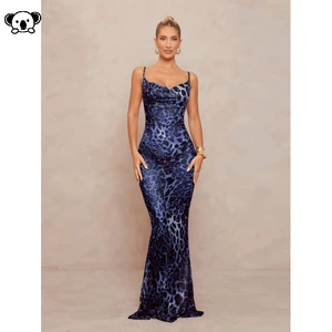 Leopard Back Tie Long Dress - A long dress with a leopard print and a back tie detail. Navy Blue XS Leopard Back Tie Long Dress - A long dress with a leopard print and a back tie detail. Navy Blue XS