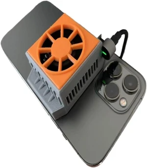 Magnetic Suction Semiconductor Refrigeration Mobile Phone Radiator 0.3 Seconds Speed Cooling Magnetic Suction Semiconductor Refrigeration Mobile Phone Radiator 0.3 Seconds Speed Cooling
