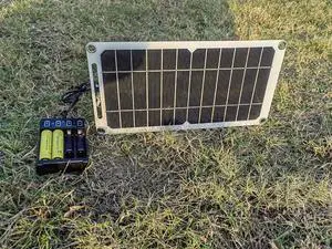 HUYINGC Solar power Charger with 6 Watt Portable Solar Panel for 1.2V AA & AAA Ni-MH Ni-CD Household Rechargeable Batteries and with 5V USB Output for cellphone or other Batteries needed charging-Blac HUYINGC Solar power Charger with 6 Watt Portable Solar Panel for 1.2V AA & AAA Ni-MH Ni-CD Household Rechargeable Batteries and with 5V USB Output for cellphone or other Batteries needed charging-Blac