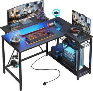 Bestier Gaming Desk with Power Outlets, 42" L-Shaped Computer Desk with LED Lights, Desk with Reversible Storage Shelves & Hooks for Small Spaces, Bedrooms & Offices, Black Carbon Fiber