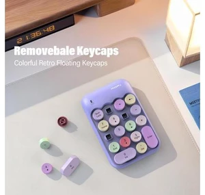 MOFII Cute Colorful Wireless Number Pad - 18 Keys, Portable 2.4 GHz with Stable Wireless Connectivity, 10-Key Financial Accounting Extension (Purple Colorful) MOFII Cute Colorful Wireless Number Pad - 18 Keys, Portable 2.4 GHz with Stable Wireless Connectivity, 10-Key Financial Accounting Extension (Purple Colorful)