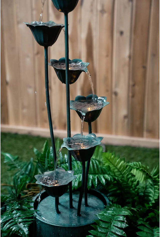 Alt view image 2 of 4 - Hi-Line Gift LED Metal Lily Flower Pouring Into Bucket Fountain