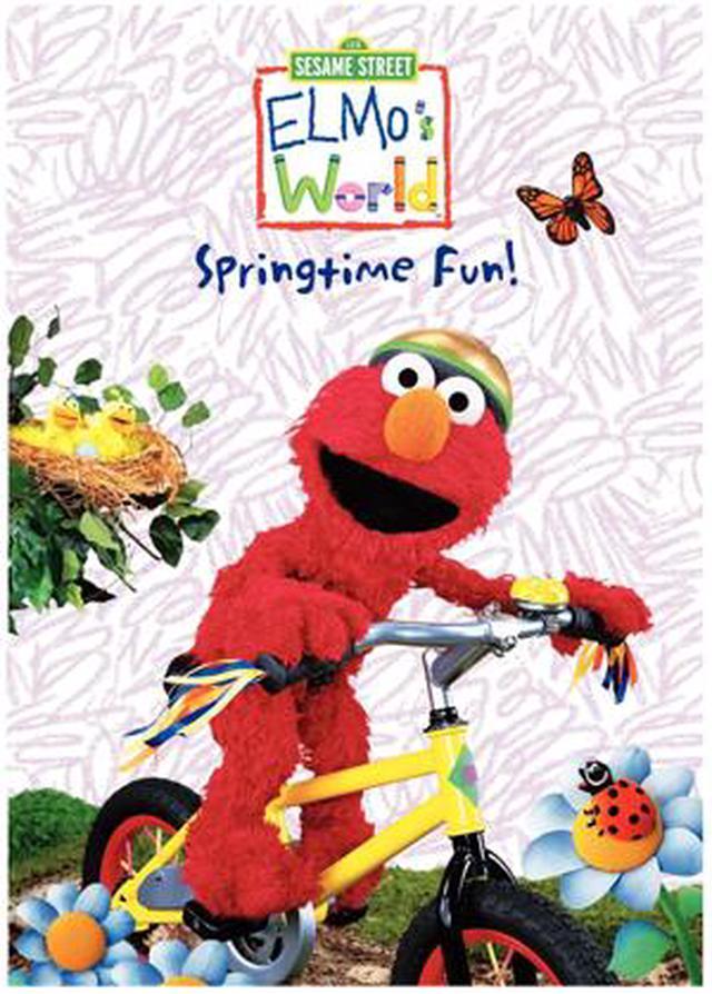 Elmo riding a online tricycle