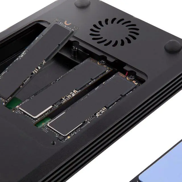 Alt view image 5 of 7 - StarTech.com 4 Bay Thunderbolt 3 NVMe External Enclosure for M.2 NVMe SSD Drives - 1x DisplayPort Video/ 2x TB3 Downstream Ports - 40Gbps - 72W Power Supply (M2E4BTB3)