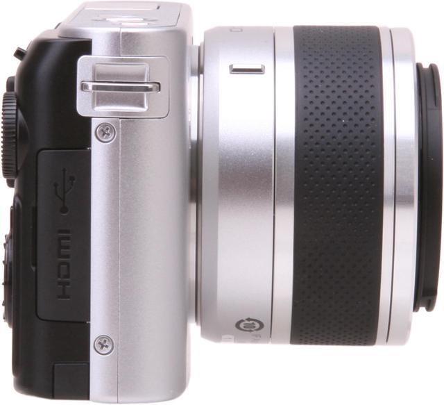 Alt view image 3 of 8 - Nikon 1 J1 Silver 10.1MP HD Digital Camera System with 10-30mm VR 1 NIKKOR Lens