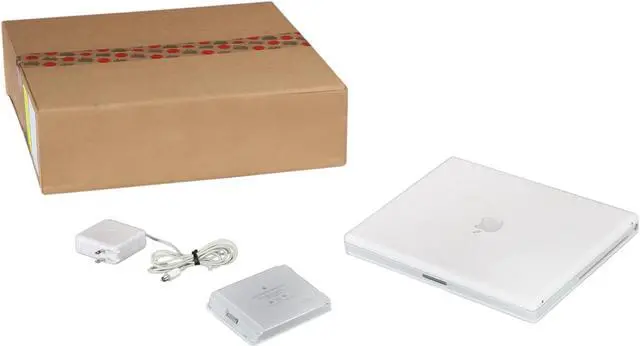 Alt view image 8 of 8 - Apple Laptop iBook G4 1.33GHz 256MB Memory 60GB HDD ATI Mobility Radeon 9200 14.1" Mac OS X 10.3 Panther M9627LL/A