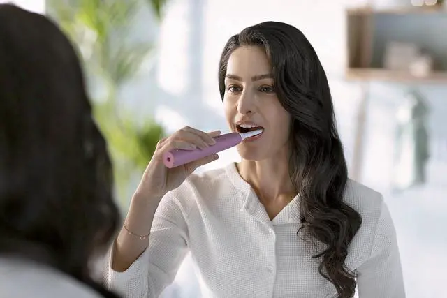 Alt view image 5 of 15 - Philips Sonicare 4100 Power Toothbrush, Rechargeable Electric Toothbrush with Pressure Sensor, Deep Pink (HX3681/26)