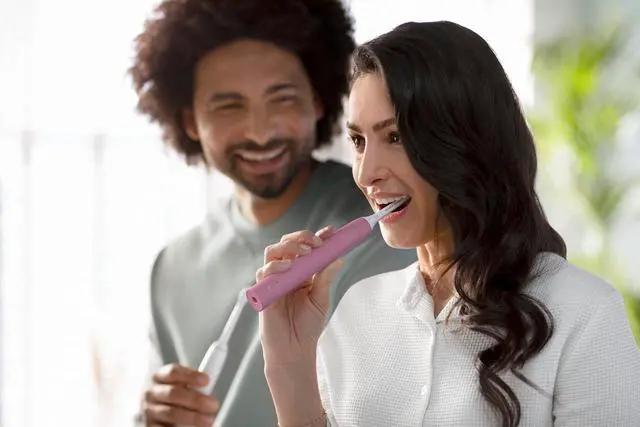 Alt view image 13 of 15 - Philips Sonicare 4100 Power Toothbrush, Rechargeable Electric Toothbrush with Pressure Sensor, Deep Pink (HX3681/26)