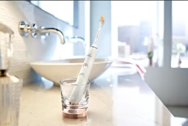 Alt view image 10 of 11 - Philips Sonicare DiamondClean Smart 9300 Electric Toothbrush, Sonic Toothbrush with App, Pressure Sensor, Brush Head Detection, 4 Brushing Modes and 3 Intensity Levels, Rosegold, (HX9903/65)