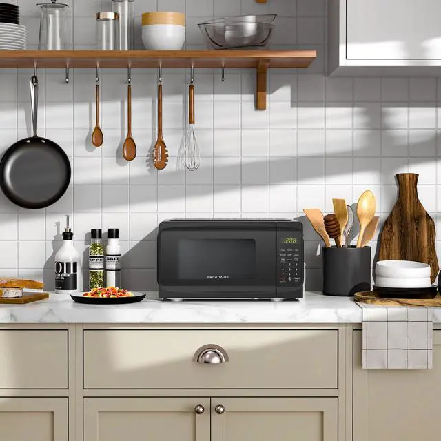 Alt view image 8 of 8 - Frigidaire 700 Watts 0.7 CU Ft Microwave White RMW733-BLACK Black