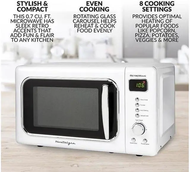 Alt view image 2 of 3 - Nostalgia Electrics 700 Watts Classic Retro 0.7 Cu. Ft. 700-Watt Countertop Microwave Oven With LED Display CLMO7WH White