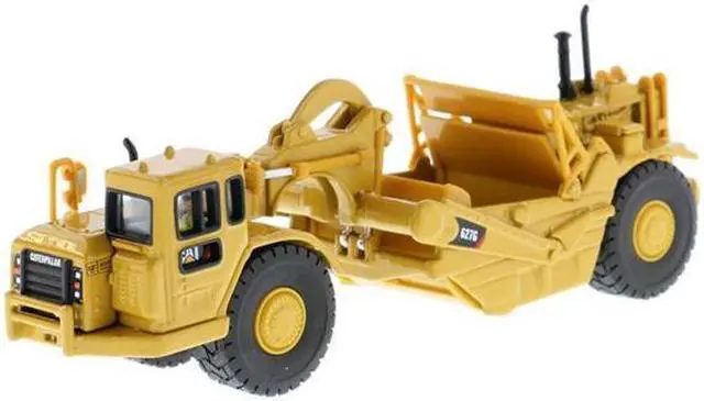 Main image of CAT Caterpillar 627G Wheeled Scraper Tractor with Operator "High Line" Series 1/87 (HO) Scale by Diecast Masters