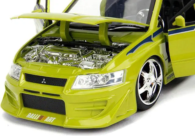 Alt view image 5 of 16 - Brian's Mitsubishi Lancer Evolution VII "The Fast and the Furious" Movie 1/24 Diecast Model Car by Jada