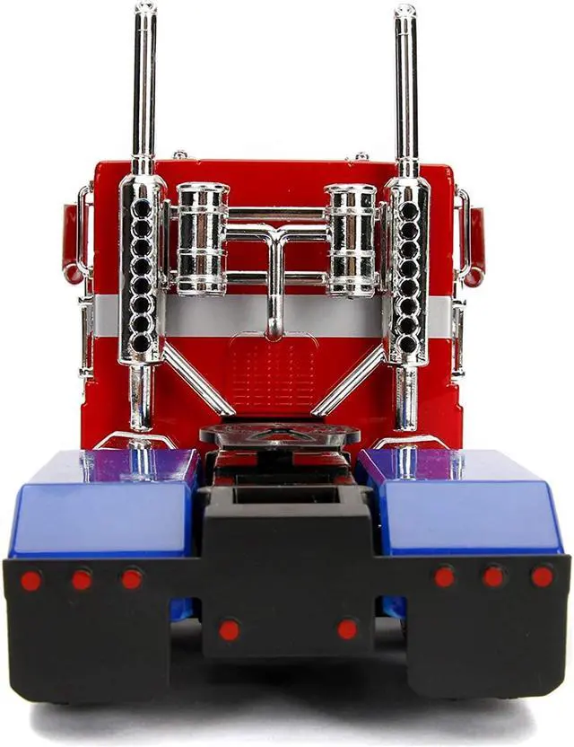 Alt view image 6 of 10 - G1 Autobot Optimus Prime Truck Red w/Robot on Chassis from "Transformers" TV Series "Hollywood Rides" 1/24 Diecast Model by Jada