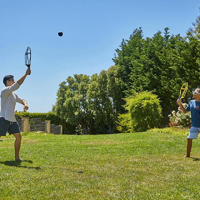 Alt view image 9 of 18 - Wham-O Game Time! Trac Ball Classic Outdoor Game with 2 Rackets and 2 Balls