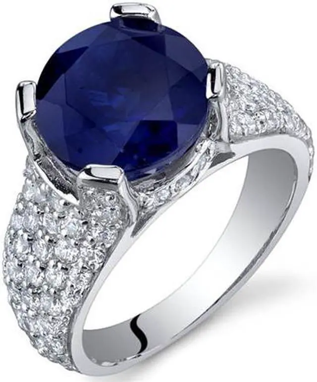Main image of Striking Exuberance 5.25 Carats Blue Sapphire Ring in Sterling Silver Size 5