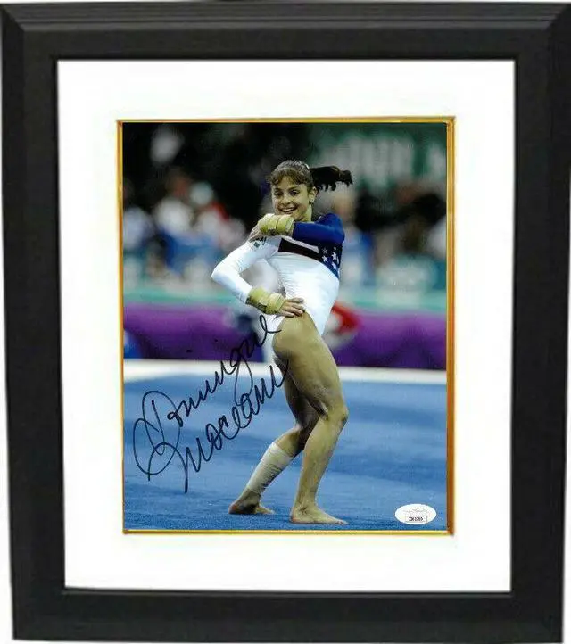 Main image of Dominique Moceanu signed 1996 Team USA Atlanta Olympics Gymnastic 8x10 Photo Custom Framing- JSA (Gold Medal/Magnificent Seven)