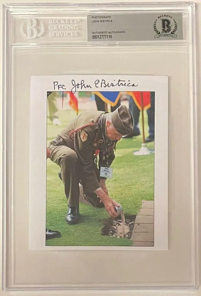 Main image of John E. Bistrica signed WWII Vintage Color 4.25x5.5 Photo- Beckett Encapsulated (Normandy, France/Omaha Beach)