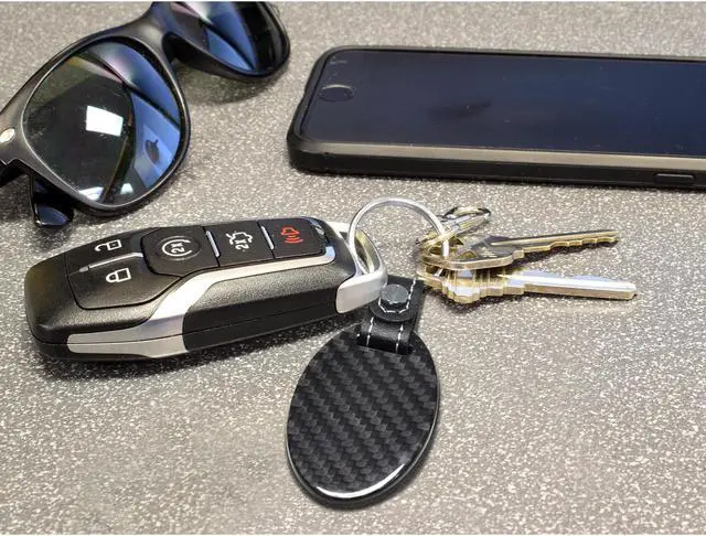 Alt view image 3 of 6 - Ford Raptor Claw Mark Real Carbon Fiber Oval Shape Black Leather Strap Key Chain