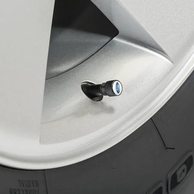 Alt view image 3 of 5 - Ford F-150 2015 to 2020 in White on Black Aluminum Tire Valve Stem Caps