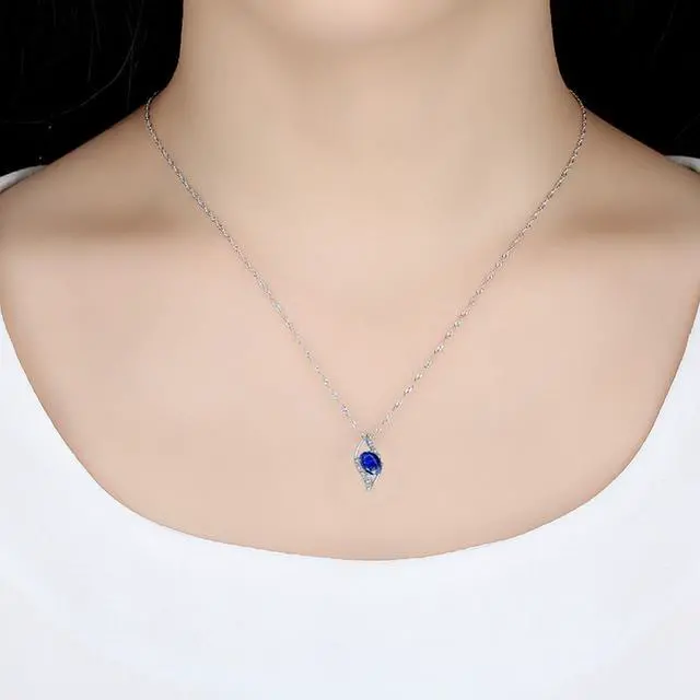 Alt view image 5 of 7 - Mabella Sterling Silver Simulated Blue Sapphire Birthstone Oval Cut Leaves Shape Pendant Necklace, Christmas Day Necklace Gifts for Women